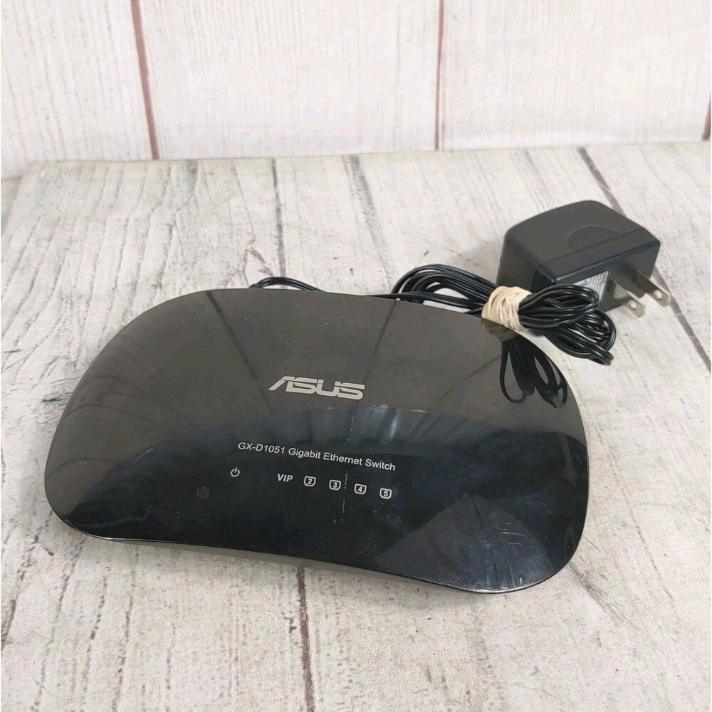 Asus GX-D1051 V3 - Gigabit Ethernet Switch 5 Port + VIP Port - AC CABLE INCLUDED